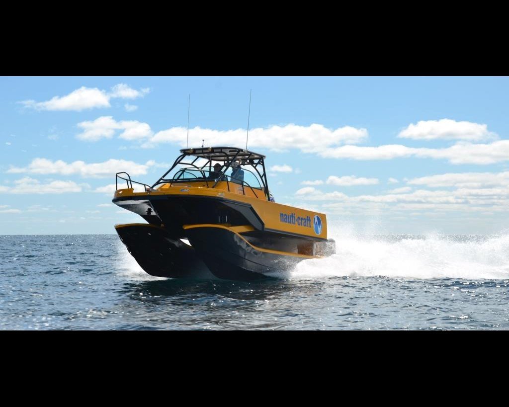 8m R&amp;D catamaran 2-Play underway with the suspension system working.