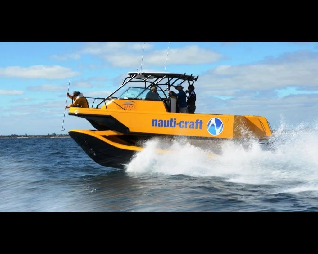 8m R&amp;D catamaran 2-Play running in chop.