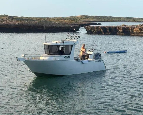 Sherwood Marine 750CCB - 7.5m Centre Cab aluminium boat kit - on the water, port bow quarter (fr windows)
