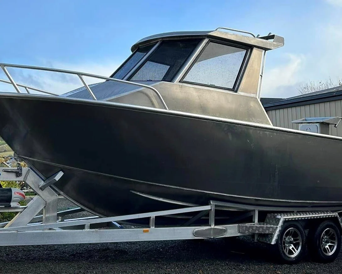 Sherwood Marine 680HT - 6.8m Hardtop aluminium boat kit - bare hull on the trailer, port bow quarter
