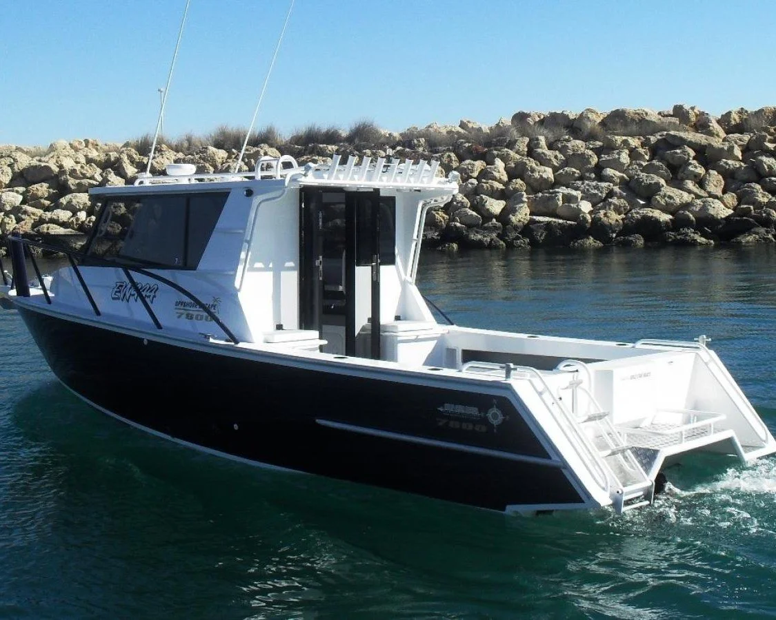 Sherwood Marine 780CAB - 7.8m Full Cab aluminium boat kit - on water, starboard quarter - sterndrive (old cab)
