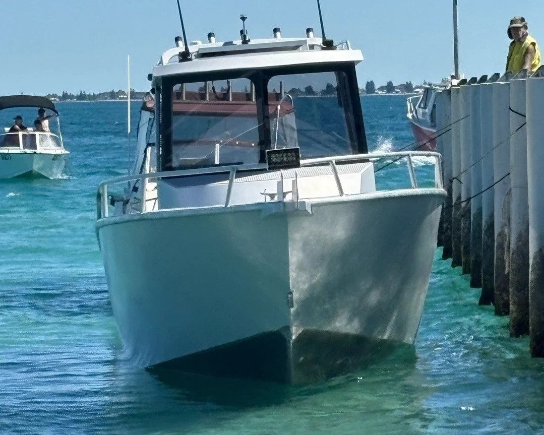 Sherwood Marine 750CCB - 7.5m Centre Cab aluminium boat kit - on the water, bow view (fr windows)
