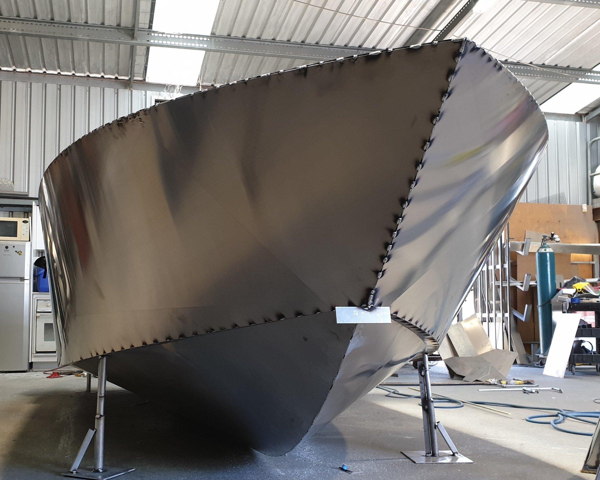 Sherwood Marine 530CC - 5.3m Centre Console aluminium boat kit - bare plated hull, bow view
