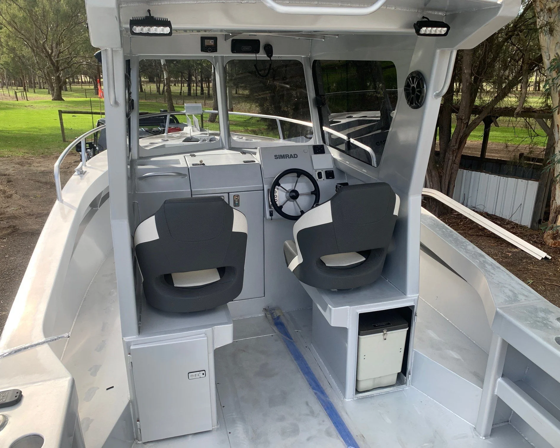 Sherwood Marine 750CCB - 7.5m Centre Cab aluminium boat kit - cockpit looking forward to the cab (fr windows)
