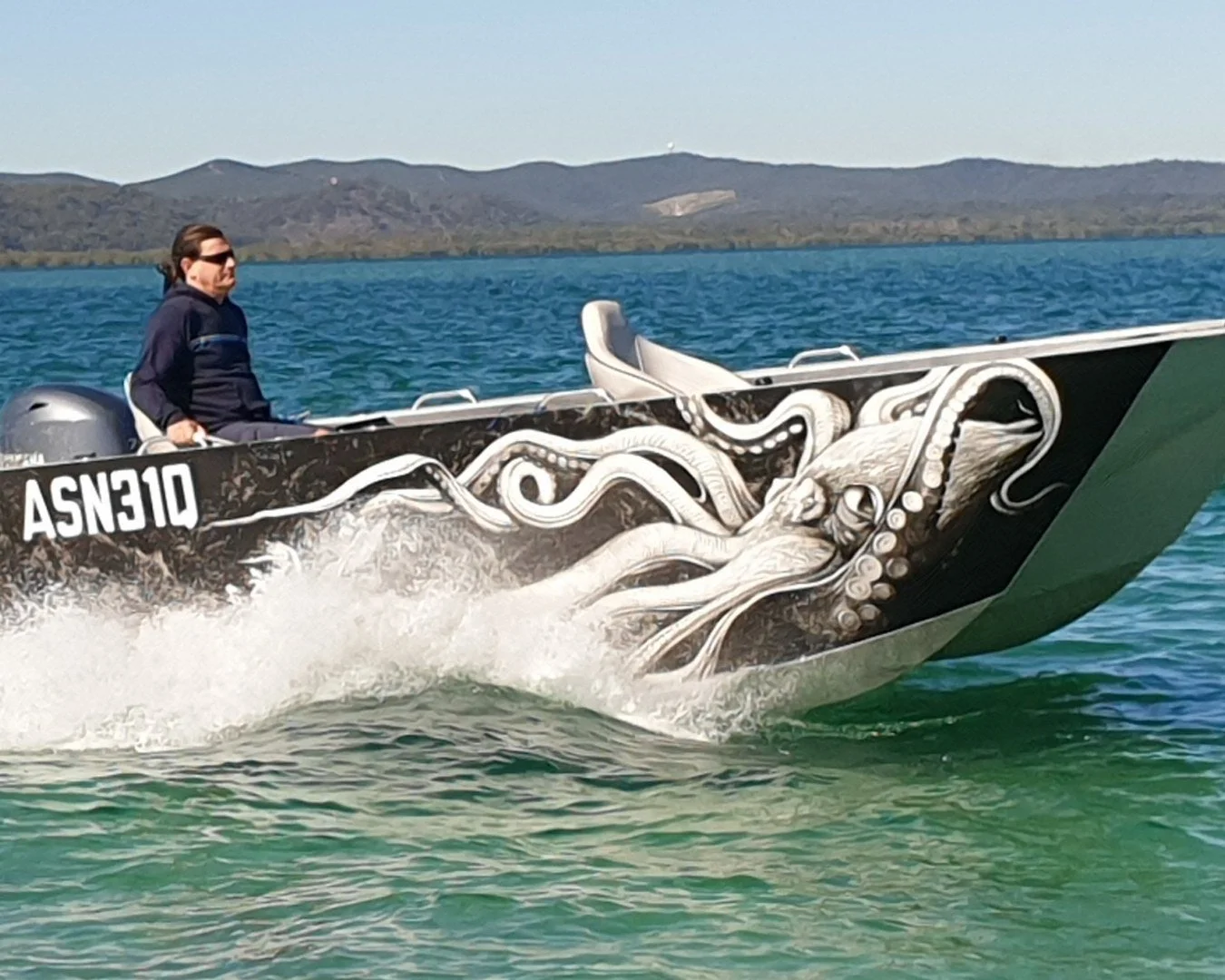 Sherwood Marine C450T tiller steer 4.5 m aluminium catamaran boat kit - on water starboard bow quarter close
