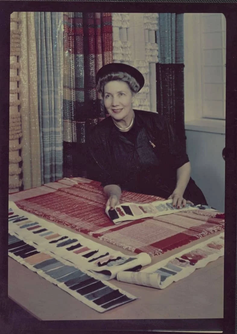 Dorothy Liebes surrounded by her textile samples, date unknown. Courtesy Smithsonian Archives of American Art