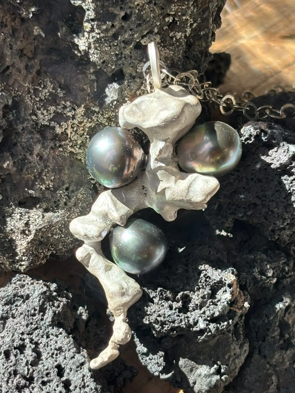 Tracey O Revuelta The Abyssal Tahitian Peacock Pearl and Reduction Fired Geological Rift Hand Cast Silver Pendant (28).jpeg