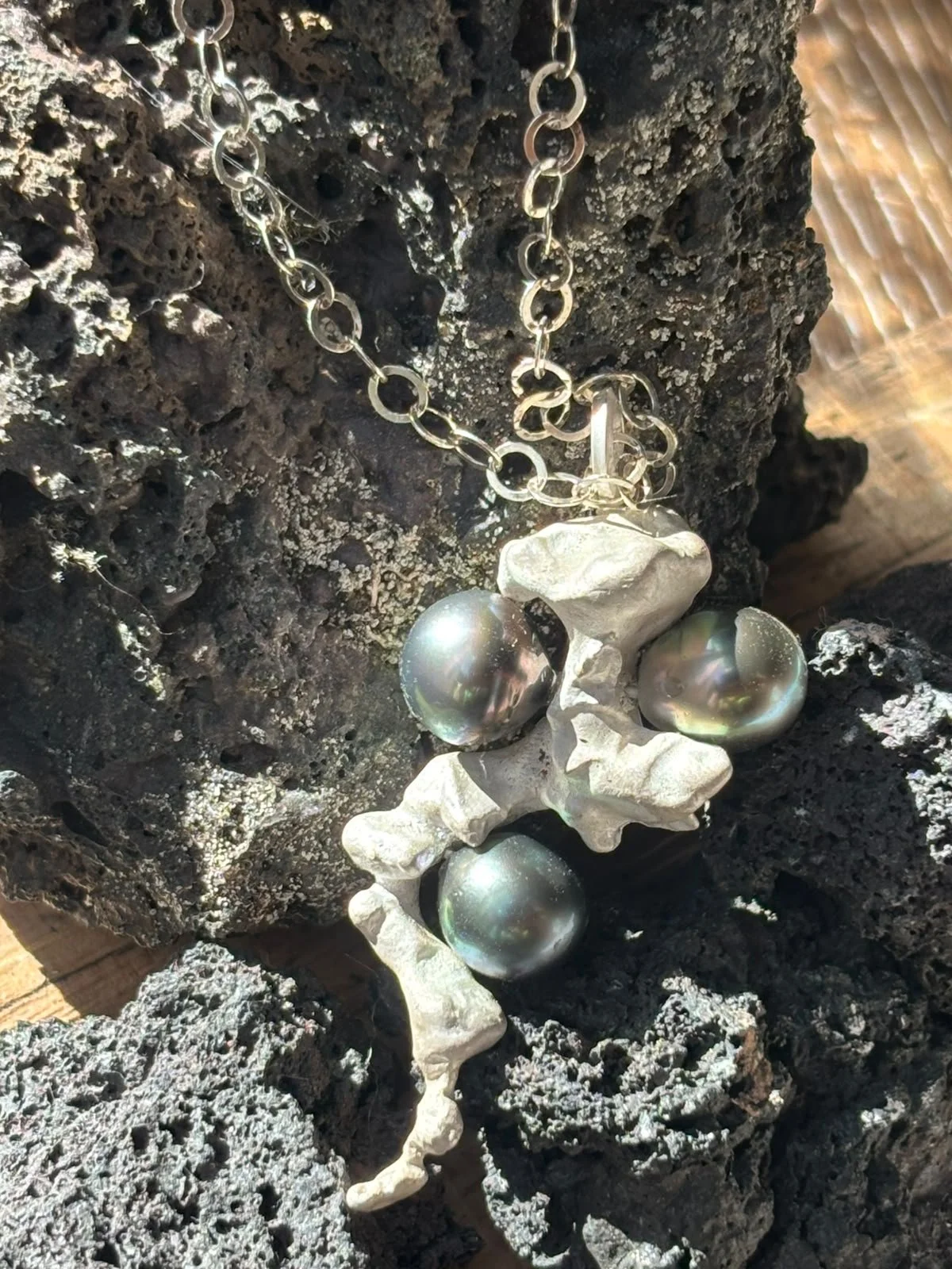 Tracey O Revuelta The Abyssal Tahitian Peacock Pearl and Reduction Fired Geological Rift Hand Cast Silver Pendant (18).jpeg