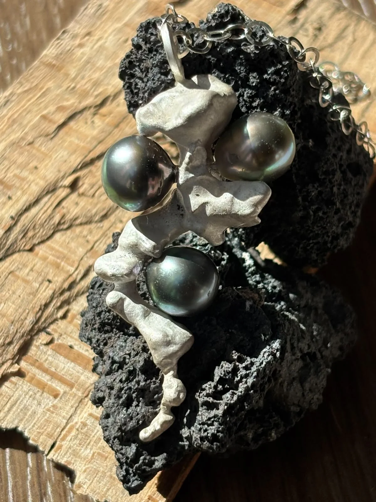 Tracey O Revuelta The Abyssal Tahitian Peacock Pearl and Reduction Fired Geological Rift Hand Cast Silver Pendant (33).jpeg