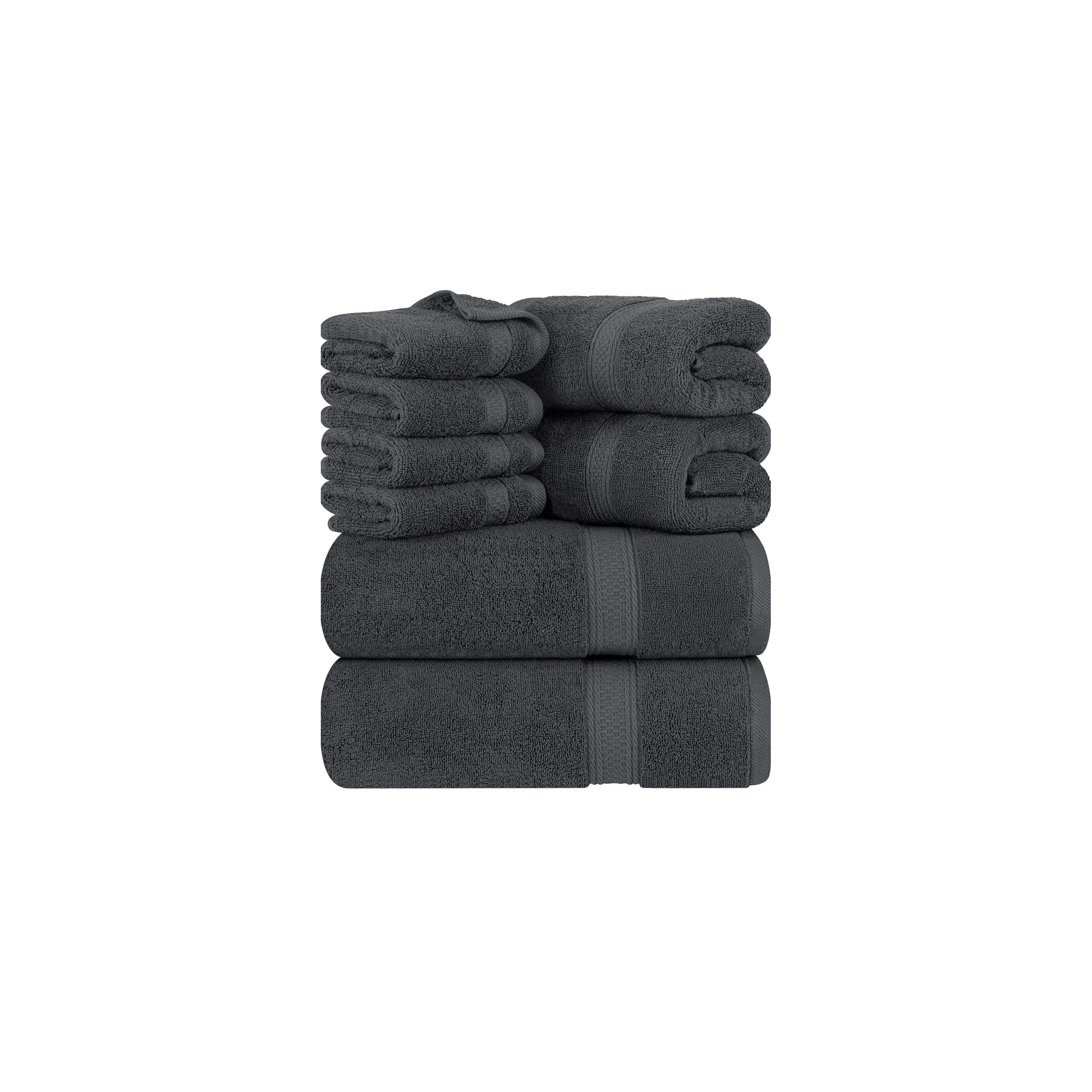 Stacked black cotton terrycloth towels.