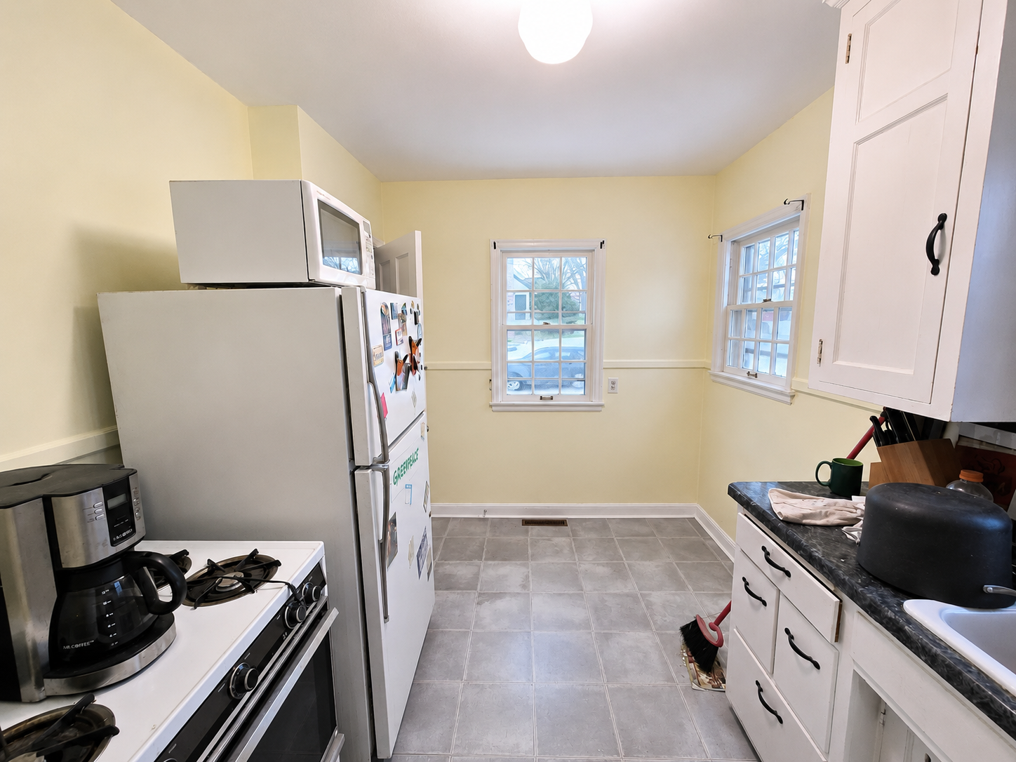 Interior repaint in Richfield, MN. We repainted the living room and kitchen walls & ceilings. We completed the project in 1 day using Sherwin Williams paint products.