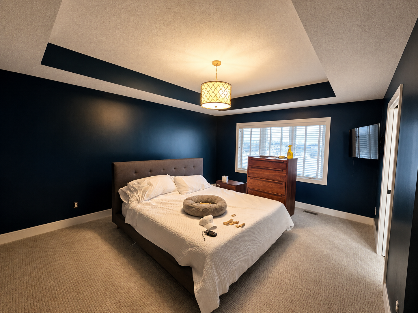 Interior Painting in Blaine, Minnesota. We completed this master suite with a deep blue color. It's a bold look, but it turned out great.