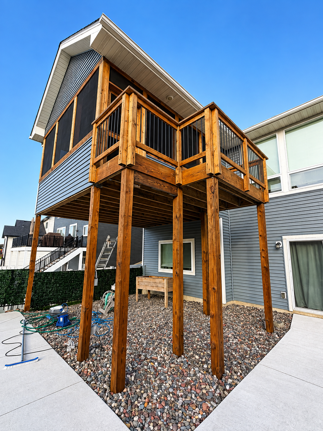 Prior Lake Deck staining. We stained this 3 season porch with a transparent superdeck stain by Sherwin Williams. It took us two days to complete.
