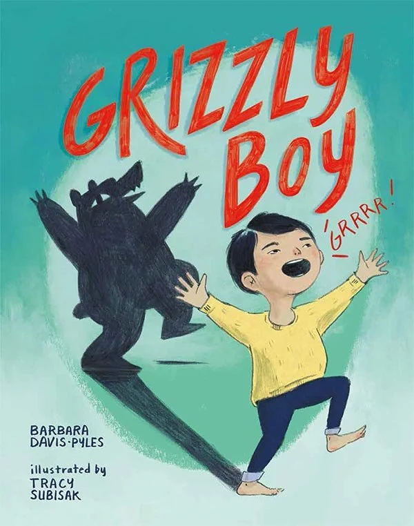 Children's book cover titled 'Grizzly Boy' by Barbara Davis-Pyles, illustrated by Tracy Subisak, showing a boy in a yellow shirt and dark pants, laughing and pretending to roar, with a shadowy grizzly bear figure behind him.