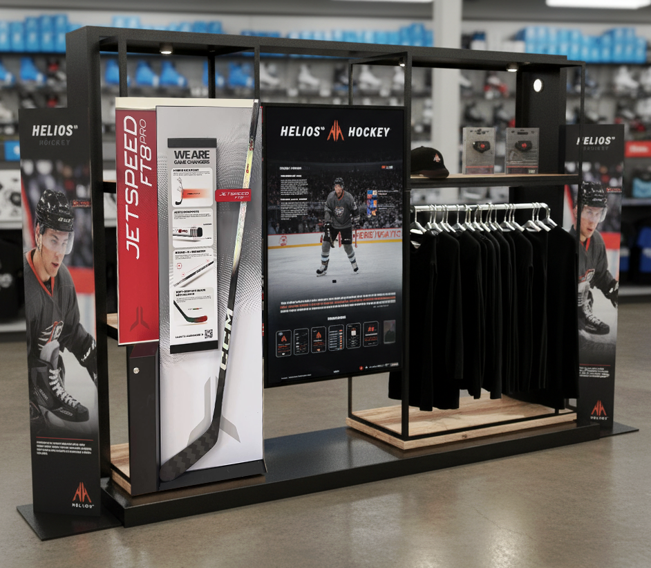 Hockey merchandise display featuring hockey sticks, apparel, and promotional materials inside a sporting goods store.