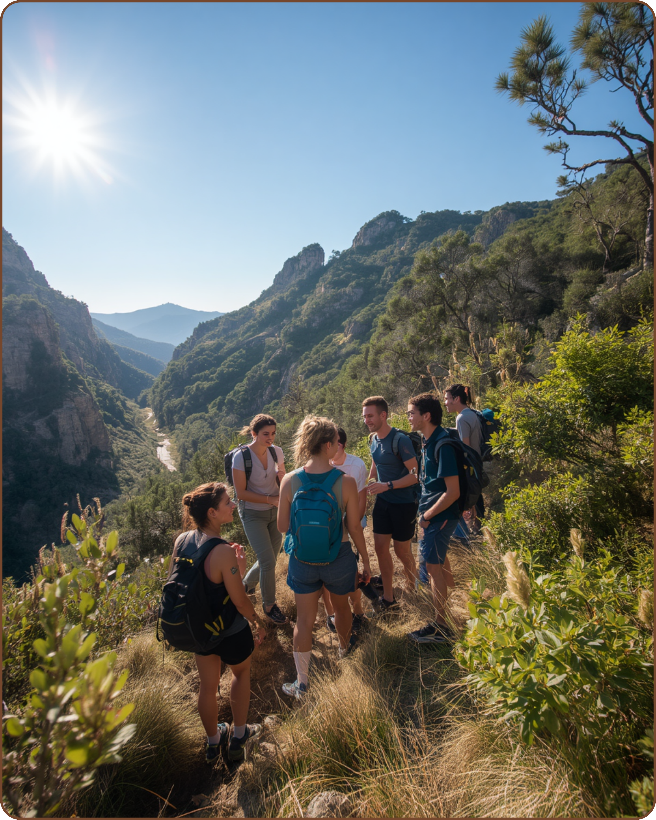 A group of hikers walking along mountain trail surrounded by beautiful natural scenery.