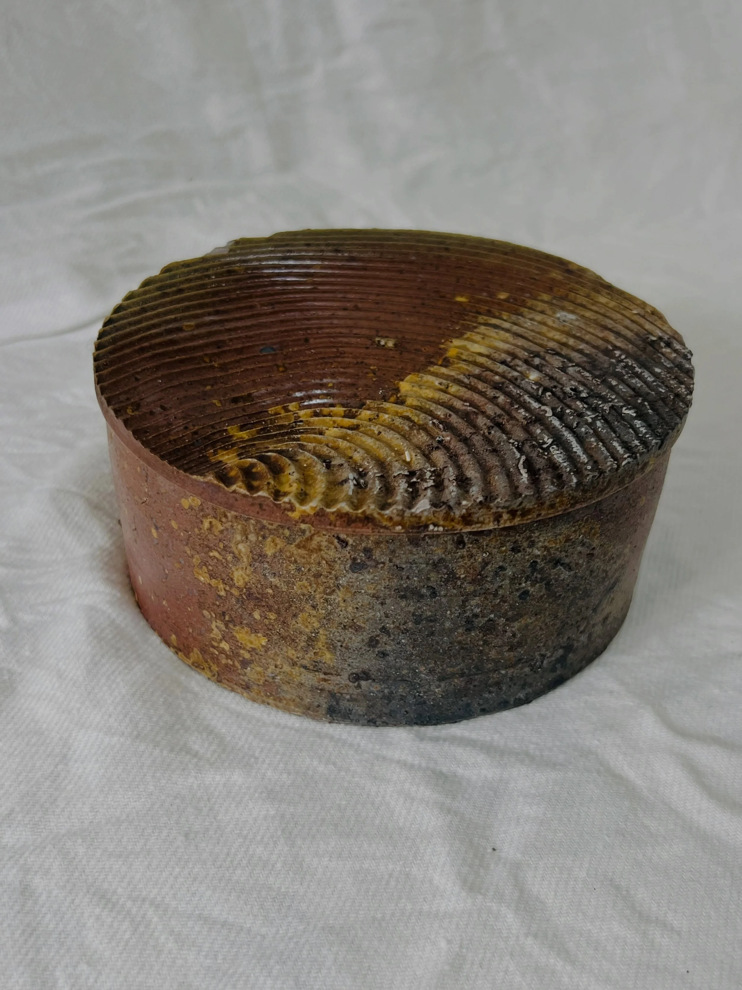 Designed to bake a Camembert in. But really you could put anything in it.
