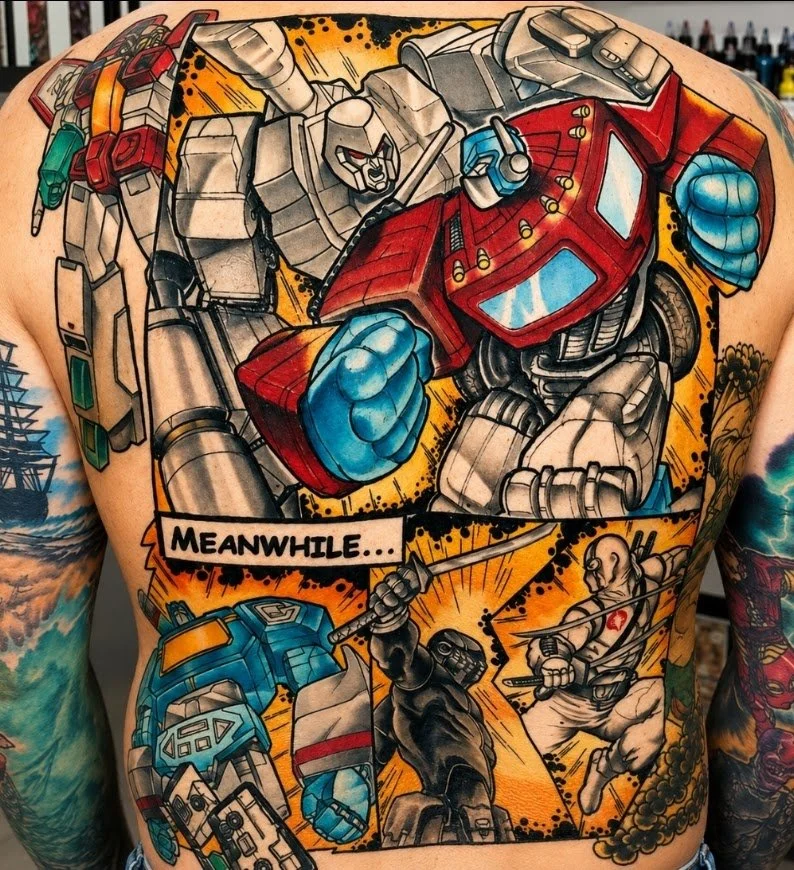 A colorful tattoo depicting Transformers characters in combat, with Optimus Prime in the center, and other robots fighting in the background.