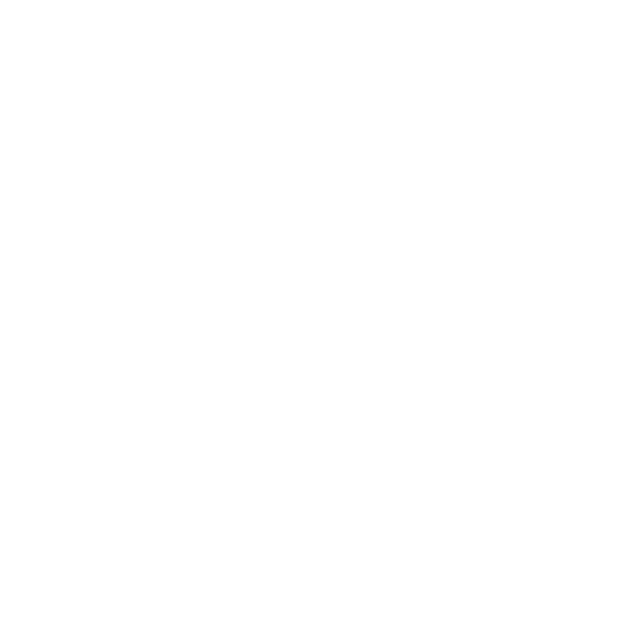 A hand placing a ballot with stars in a ballot box, indicating voting or elections.
