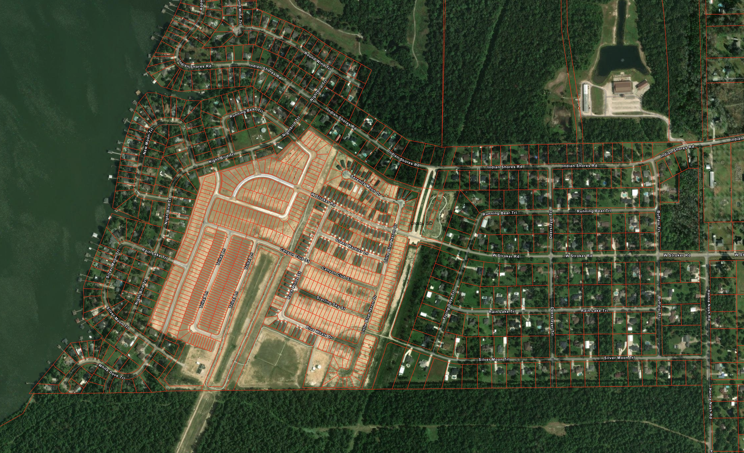 A satellite view of a residential area near a body of water, with property lines marked in red and street names visible, including Indian Shores Rd and Night Bird Trl.