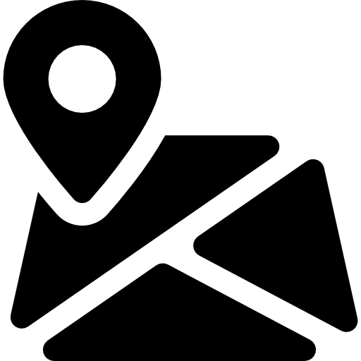 Black and white icon of a map with a pin point