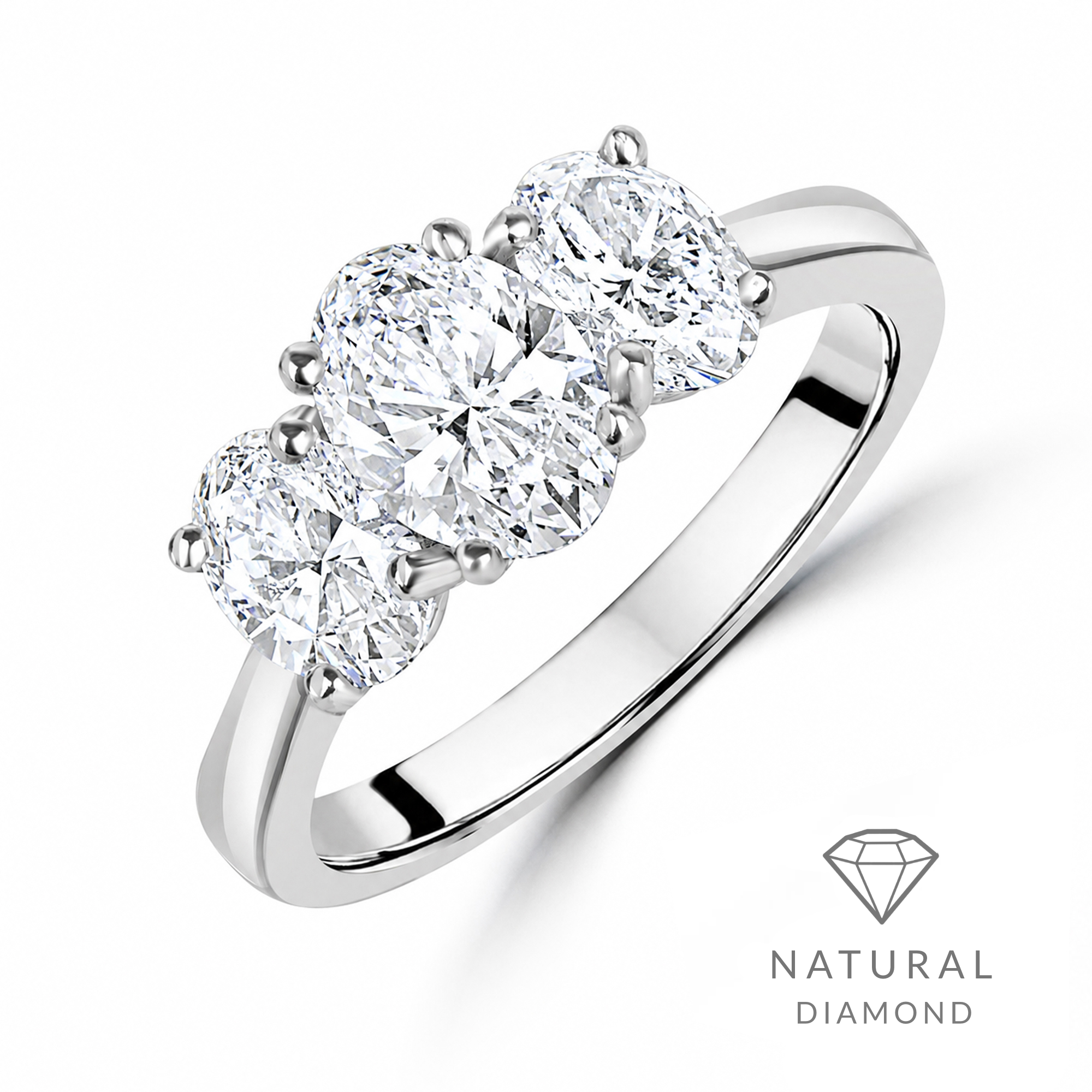 3_stone_oval_diamond_platinum_ring_-_natural.png