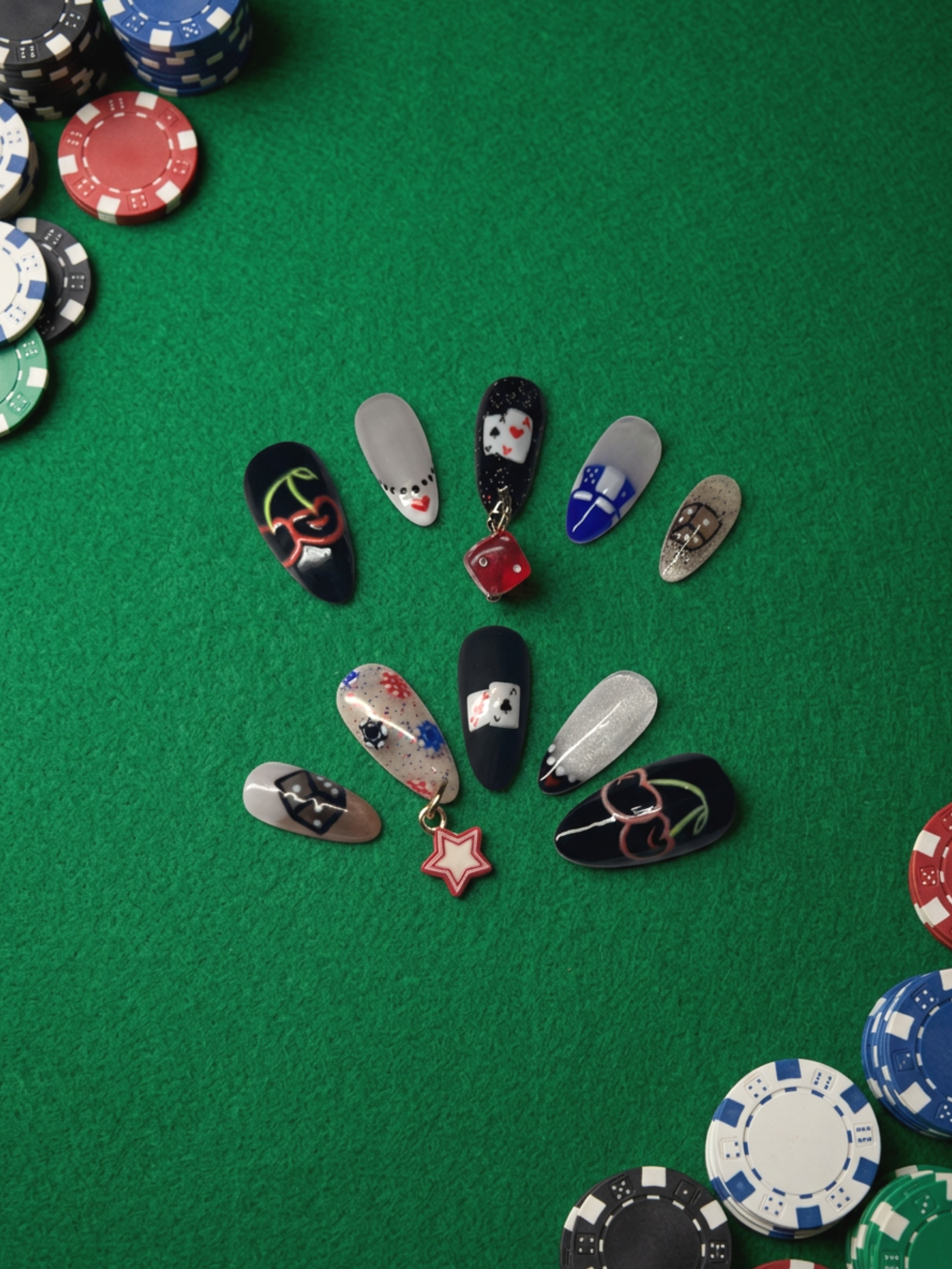Las+Vegas+Nails+arranged+on+poker+table.png