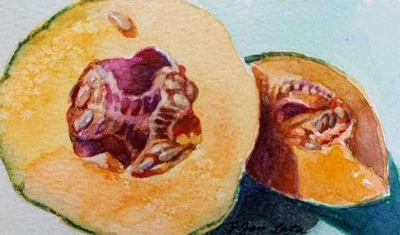 Watercolor painting of a halved peach and a sliced peach wedge
