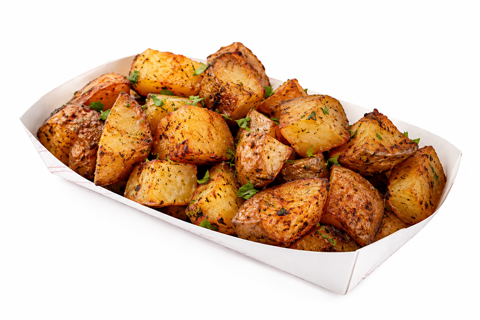Golden roasted potatoes garnished with chopped herbs in a white dish