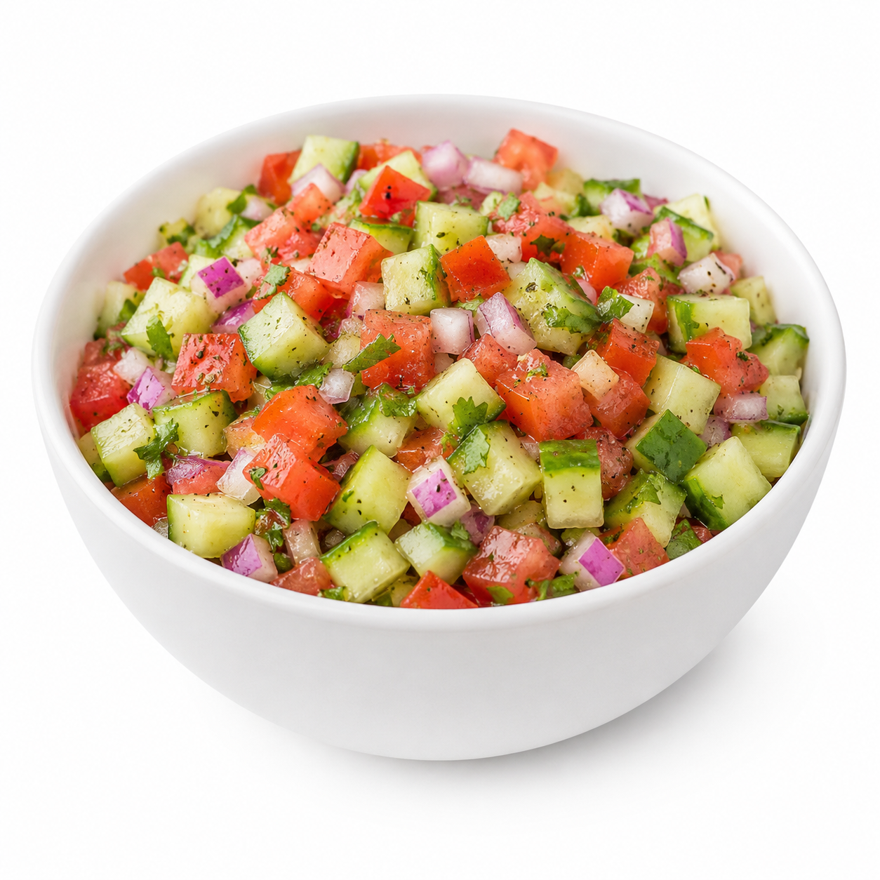 A white bowl filled with fresh chopped cucumber, tomato, red onion, and cilantro salad.