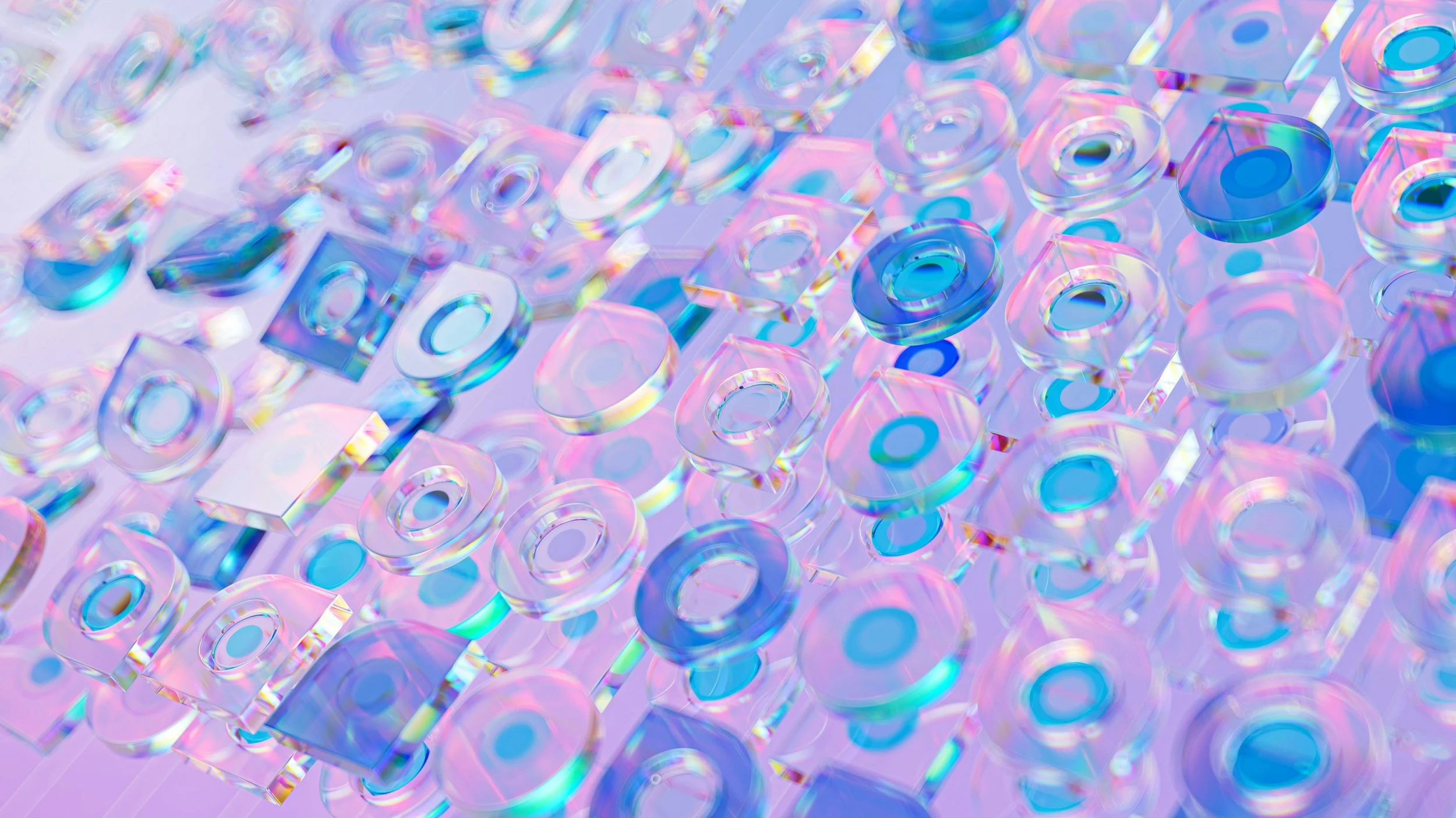 Iridescent transparent disks scattered on a pastel pink and purple surface.