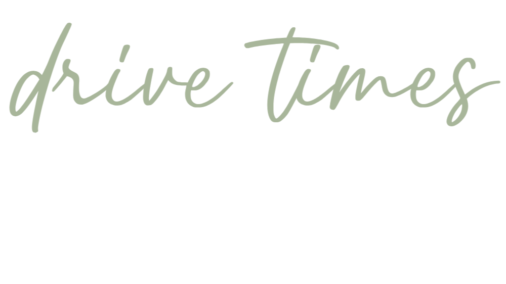 A black background with the phrase 'drive times' written in a large, light green, cursive font.