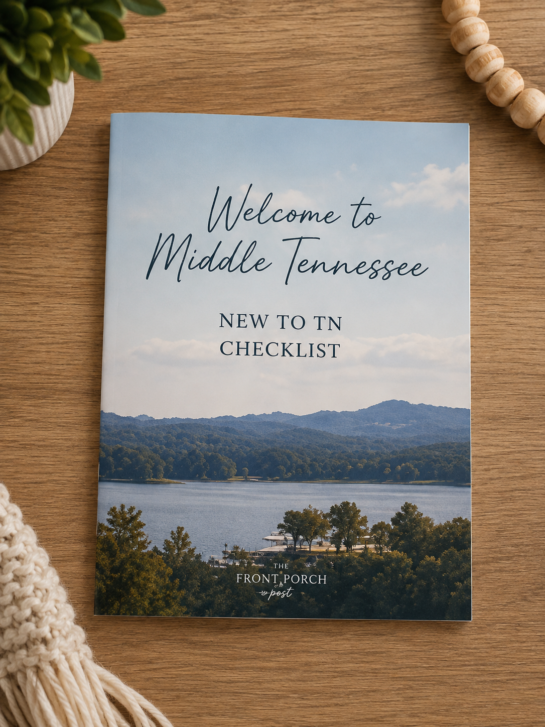 Brochure titled 'Welcome to Middle Tennessee' with a landscape photo of mountains, a river, and trees.