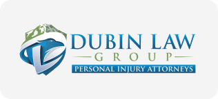 DUBIN LAW GROUP personal injury attorneys logo with a stylized shield and scales of justice