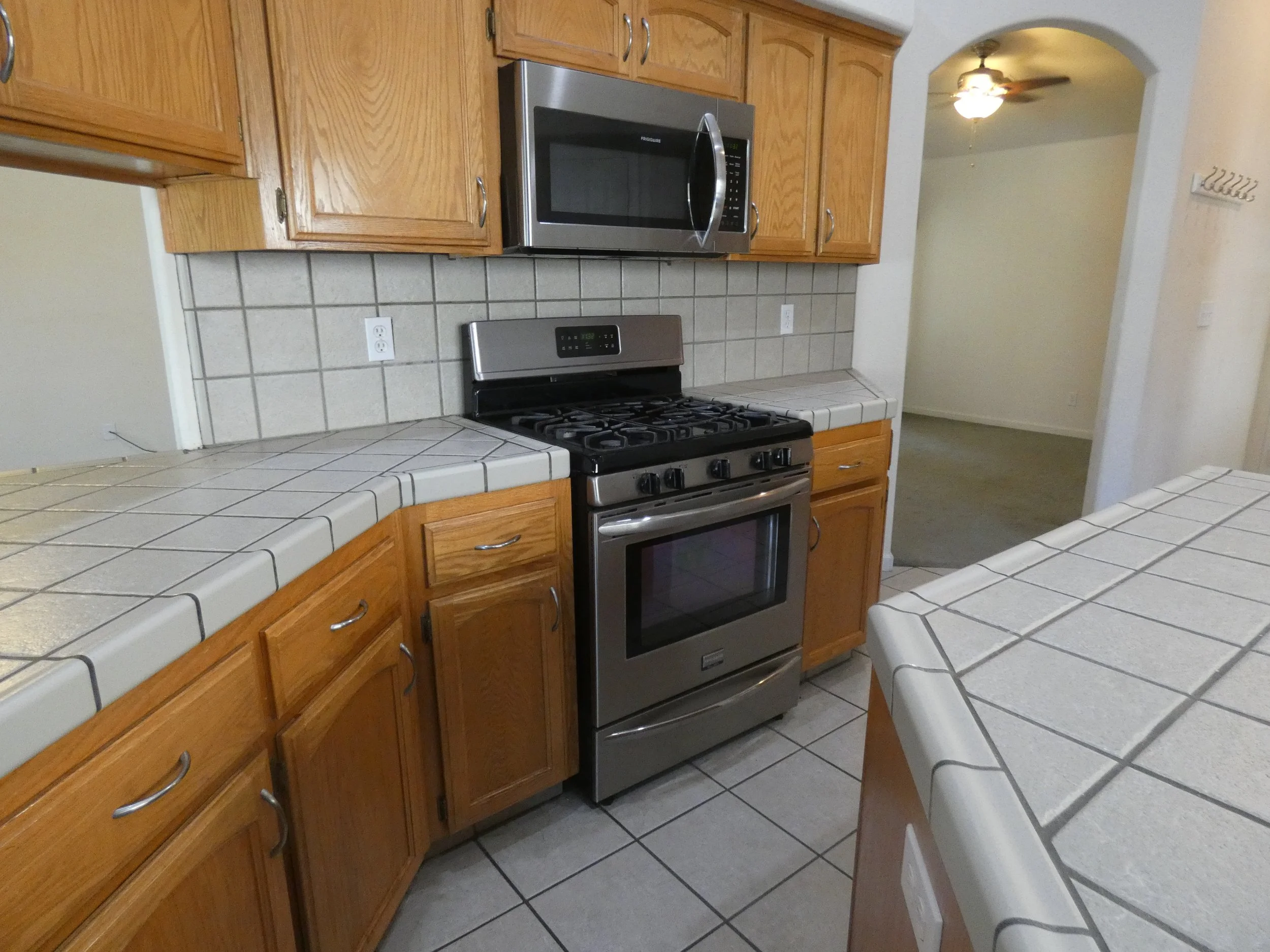 Custom designed kitchen with stainless steel appliances.