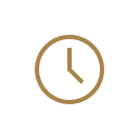 Close-up of a clock showing the time at 10:10.