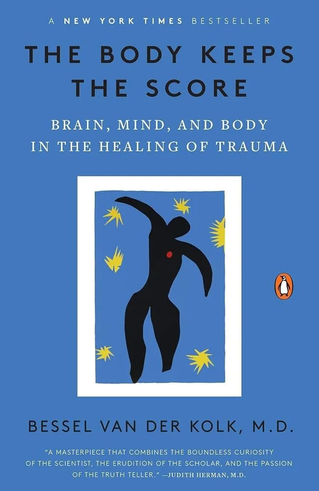 Cover of the book "The Body Keeps the Score" by Bessel van der Kolk featuring a stylized human silhouette with stars and sparks around it, blue background, and Penguin Publishing logo.