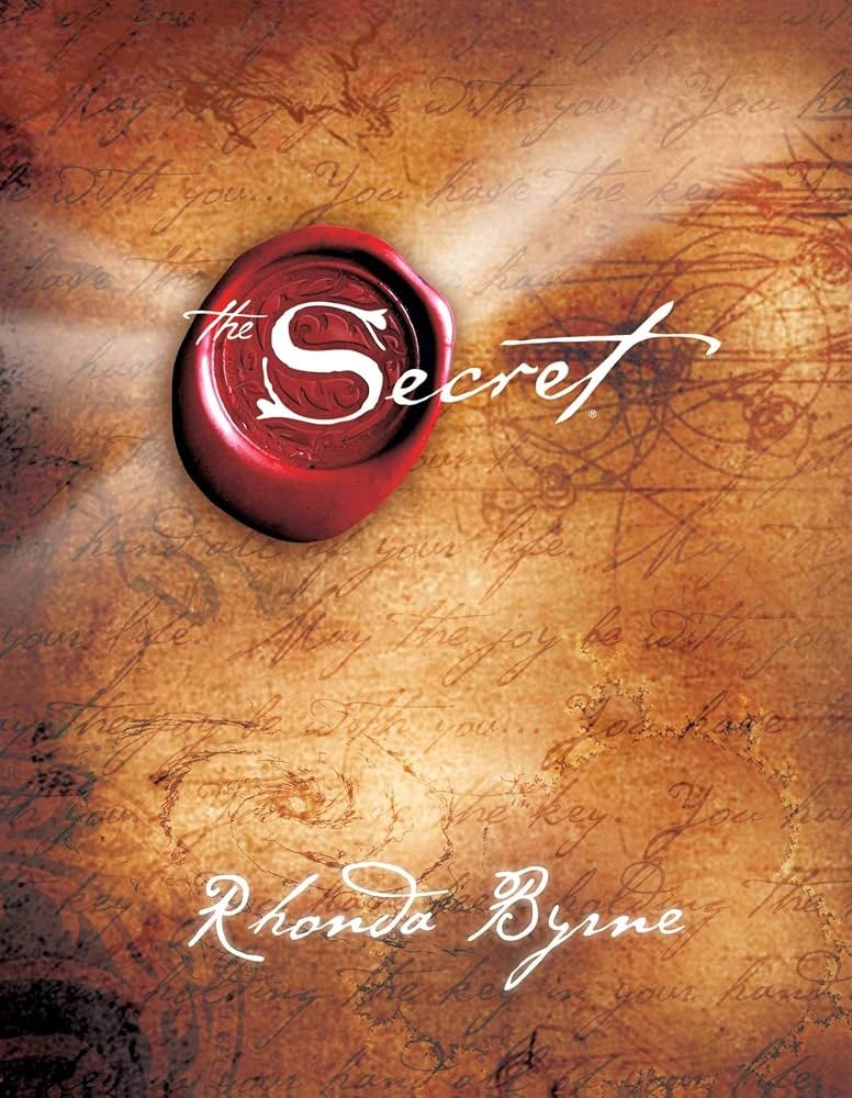 A background resembling old parchment with cursive handwriting, featuring a red wax seal with a white letter "S" and the words "the Secret" across the image, and the name "Rhonda Byrne" at the bottom.
