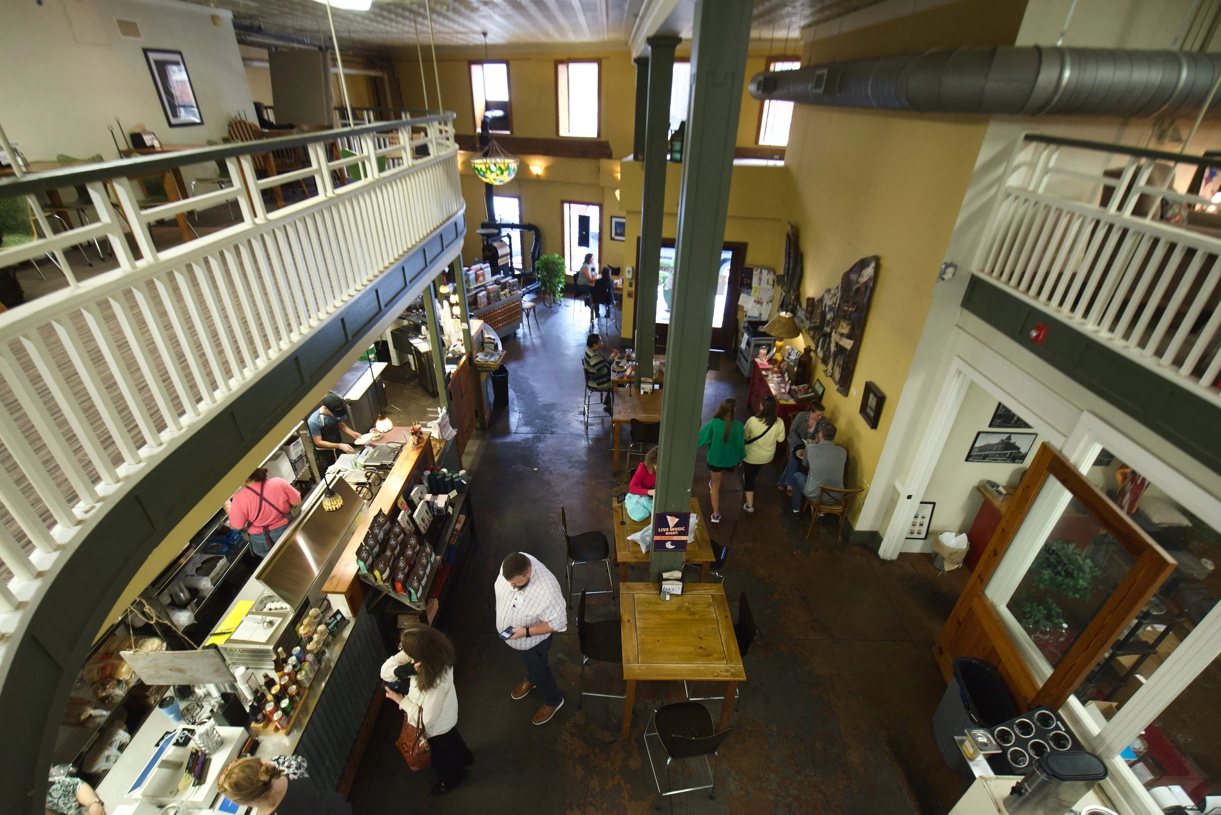 Interior of Lee's Coffee & Tea from the second-floor balcony overlooking the area.
