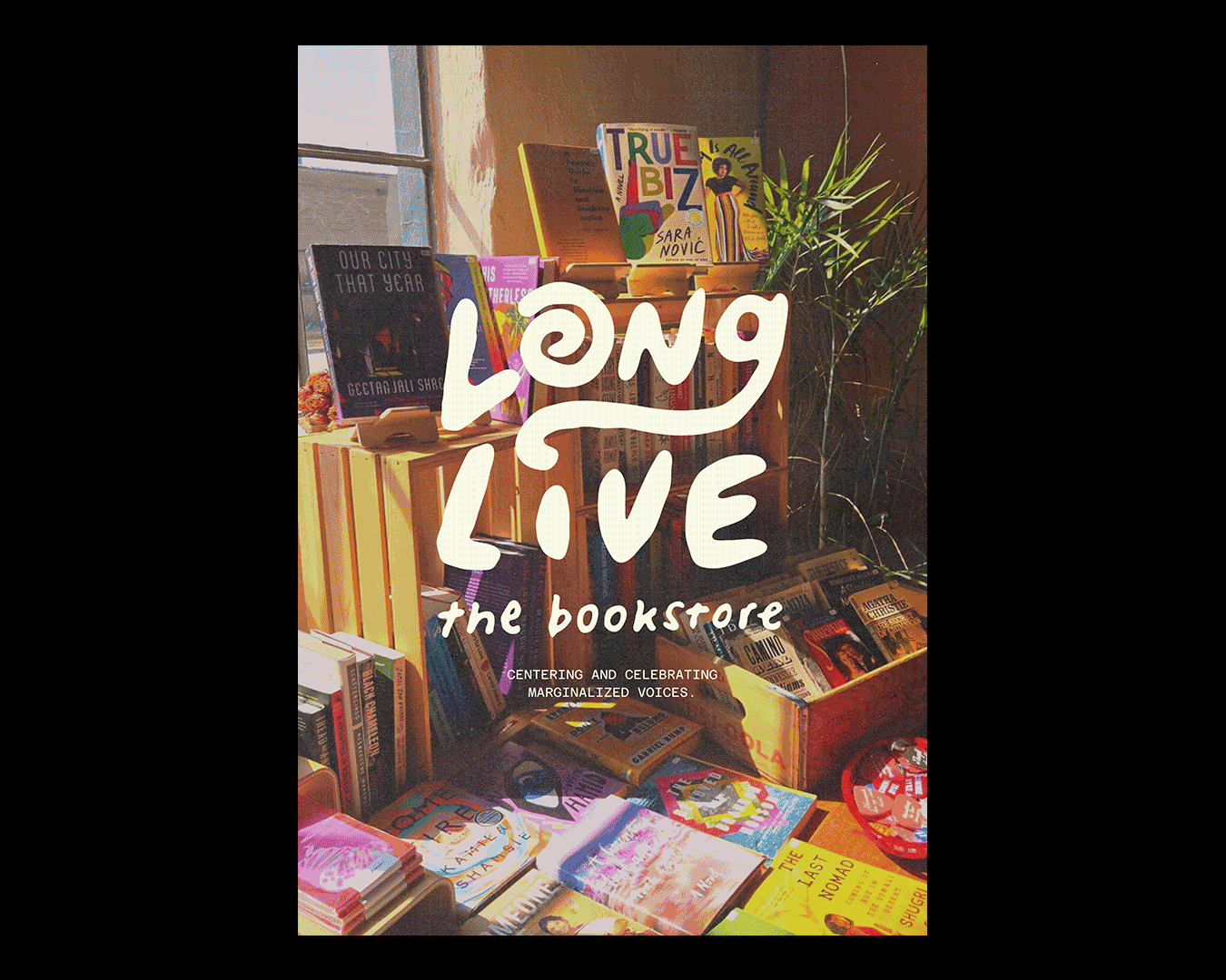 Photograph of a bookstore display with books on wooden shelves and tables, some with colorful covers, and a large window in the background. Superimposed text reads 'Long Live the Bookstore' and 'Centering and Celebrating Marginalized Voices'.