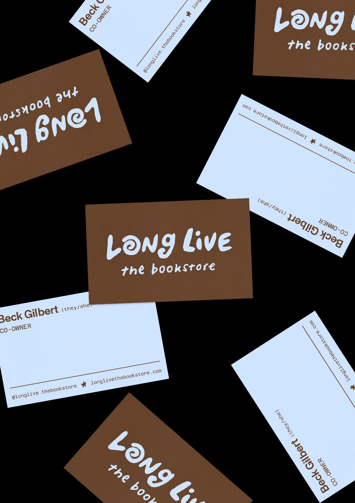 Business cards for Long Live the Bookstore. The cards have a brown background with white and black text, including the store's name, owner Beck Gilbert, and contact information, scattered on a black background.