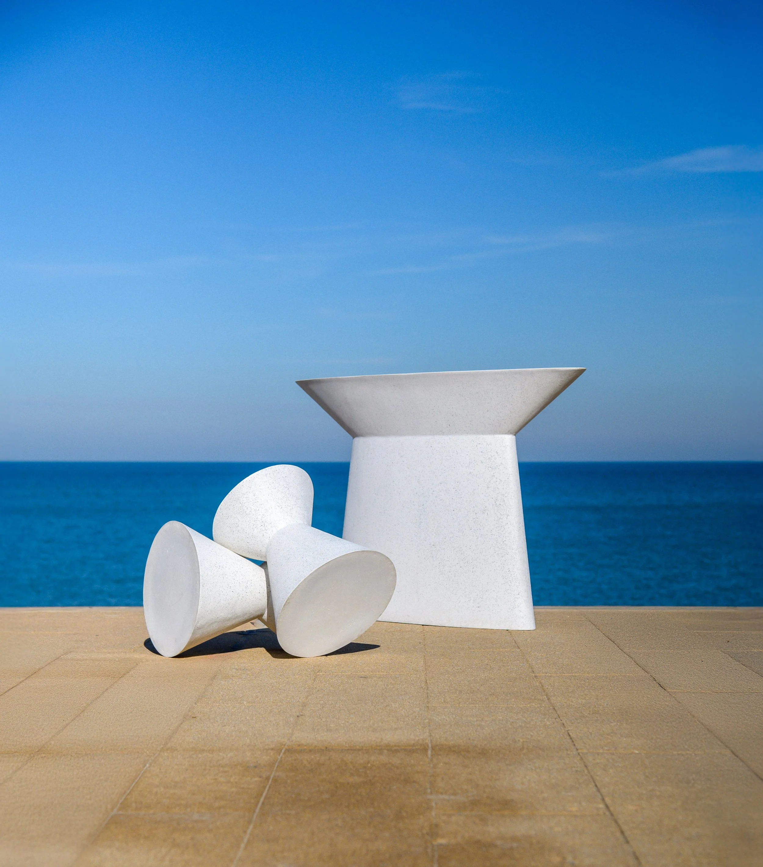 Zachary A. Design Kona Stool and Kona Console Table at the waterfront