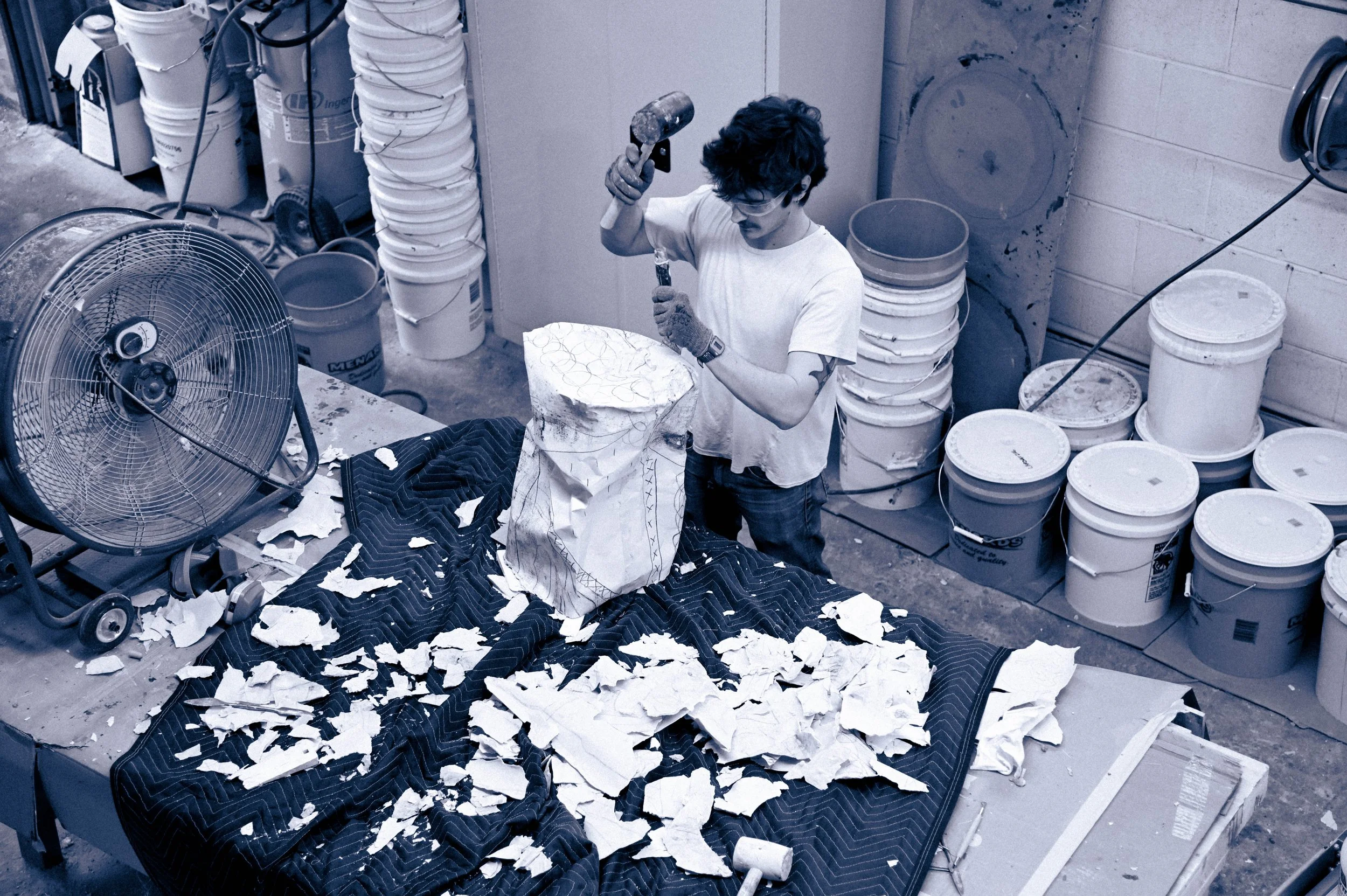 The mold is destroyed to reveal the piece.