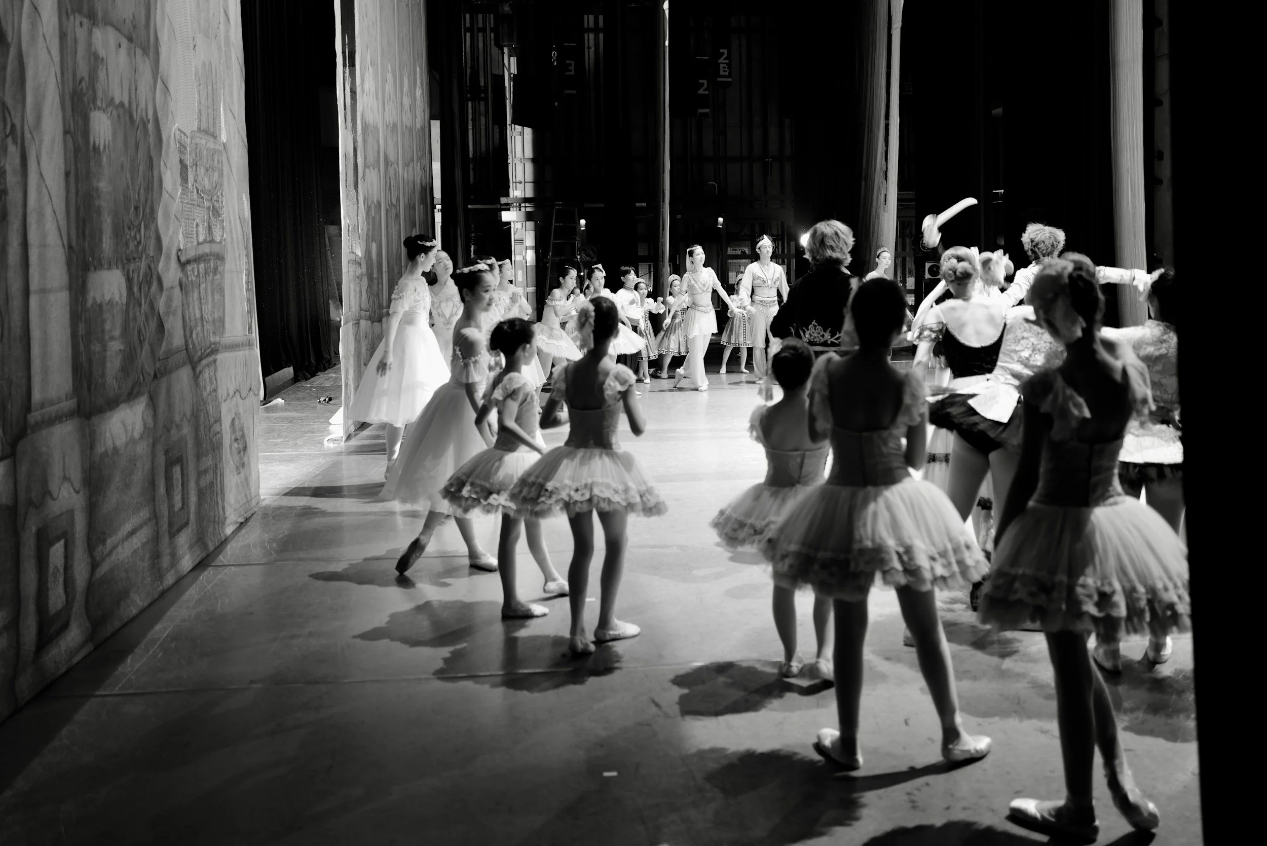 Ballet dancers preparing backstage before a performance, representing creativity, discipline, and human expression