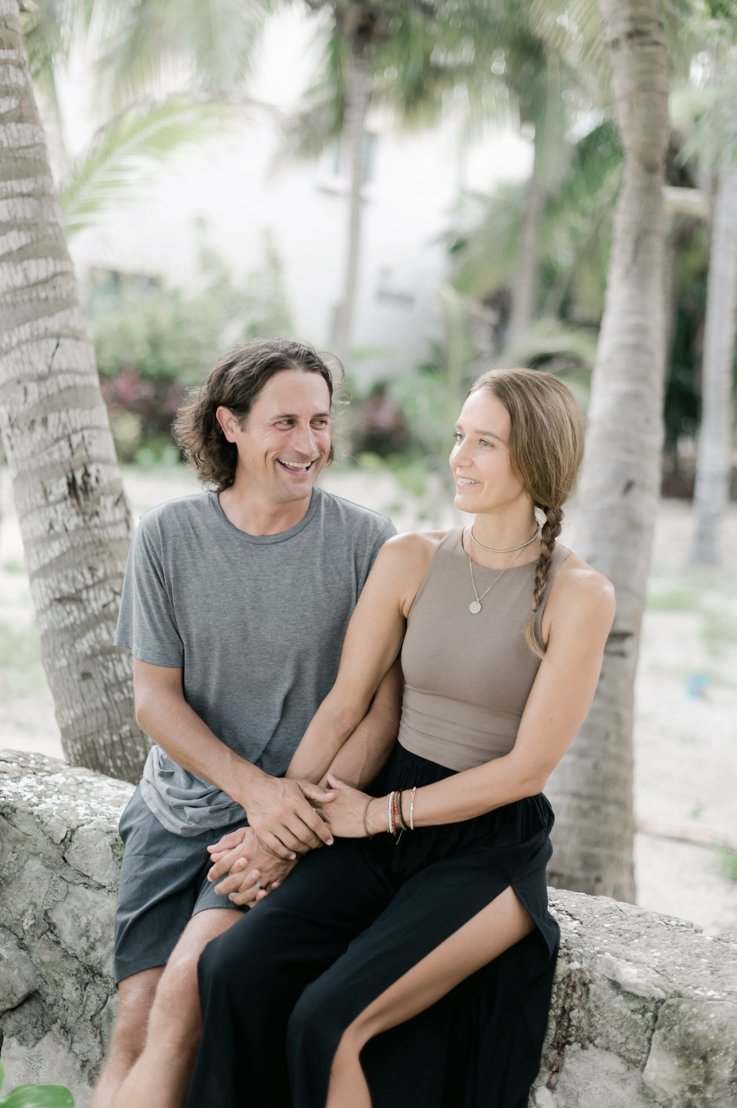 Couple holding hands and experiencing deep connection and intimacy in relationship.