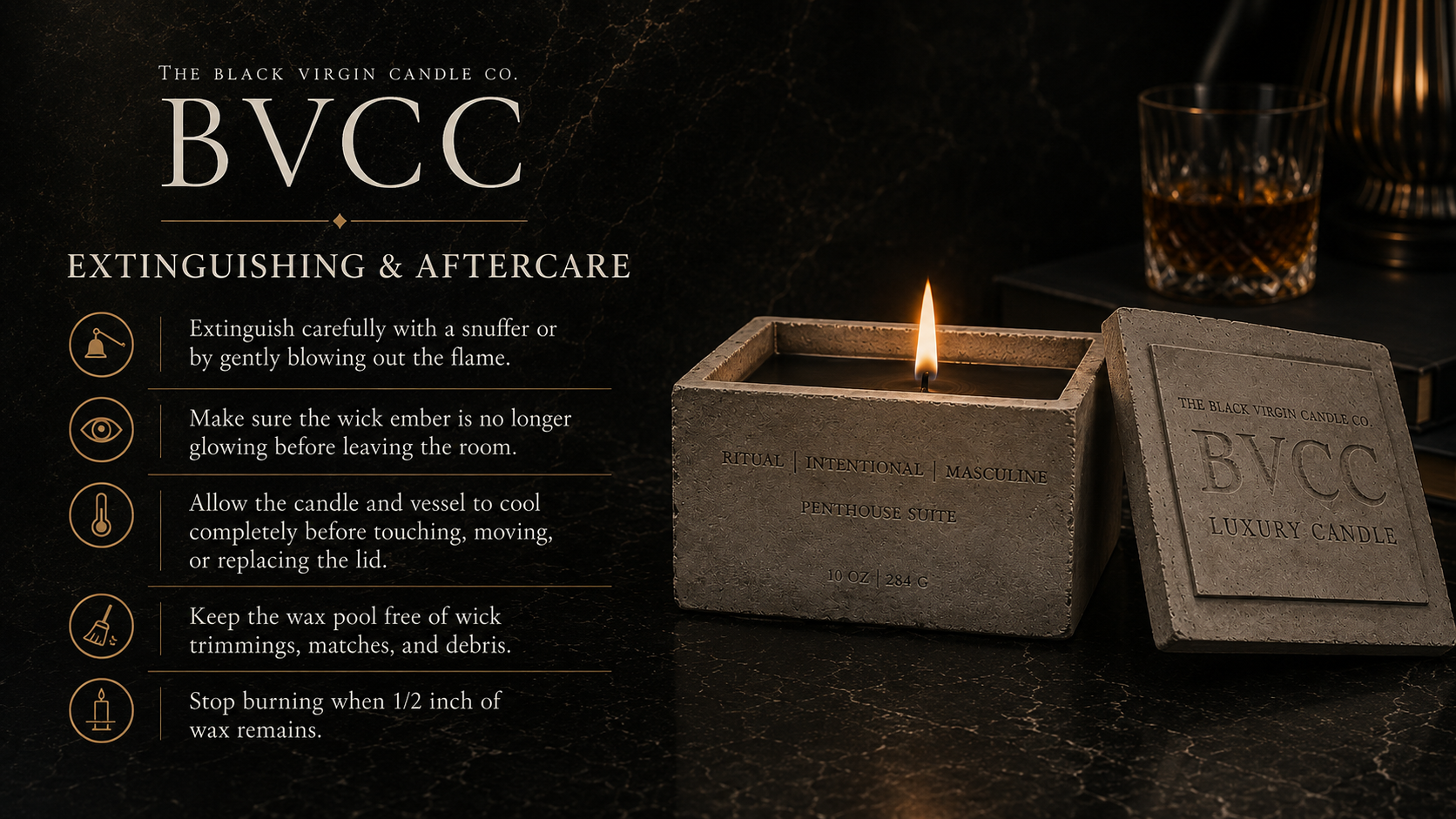 Instructions for extinguishing and caring for a luxury candle from The Black Virgin Candle Co. next to a lit candle in a square concrete holder, on a dark marble surface.