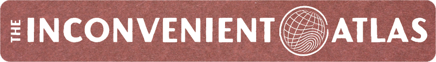 The logo of The Inconvenient Atlas with stylized text and a globe icon.