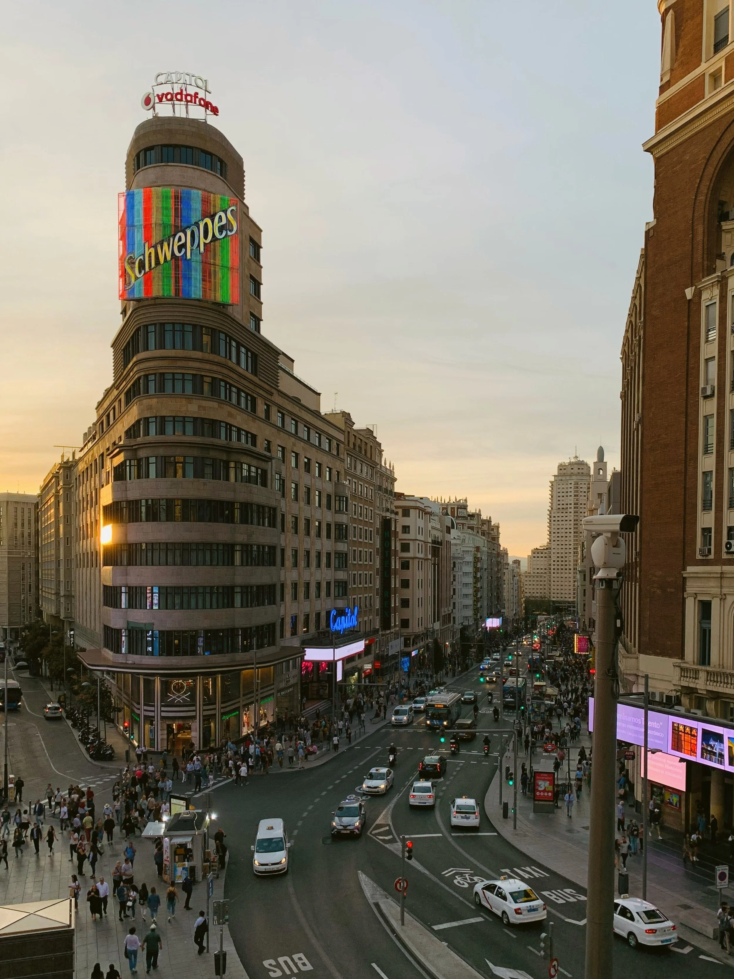 Edificio Capitol with the Schweppes sign at sunset on Gran Vía, Madrid