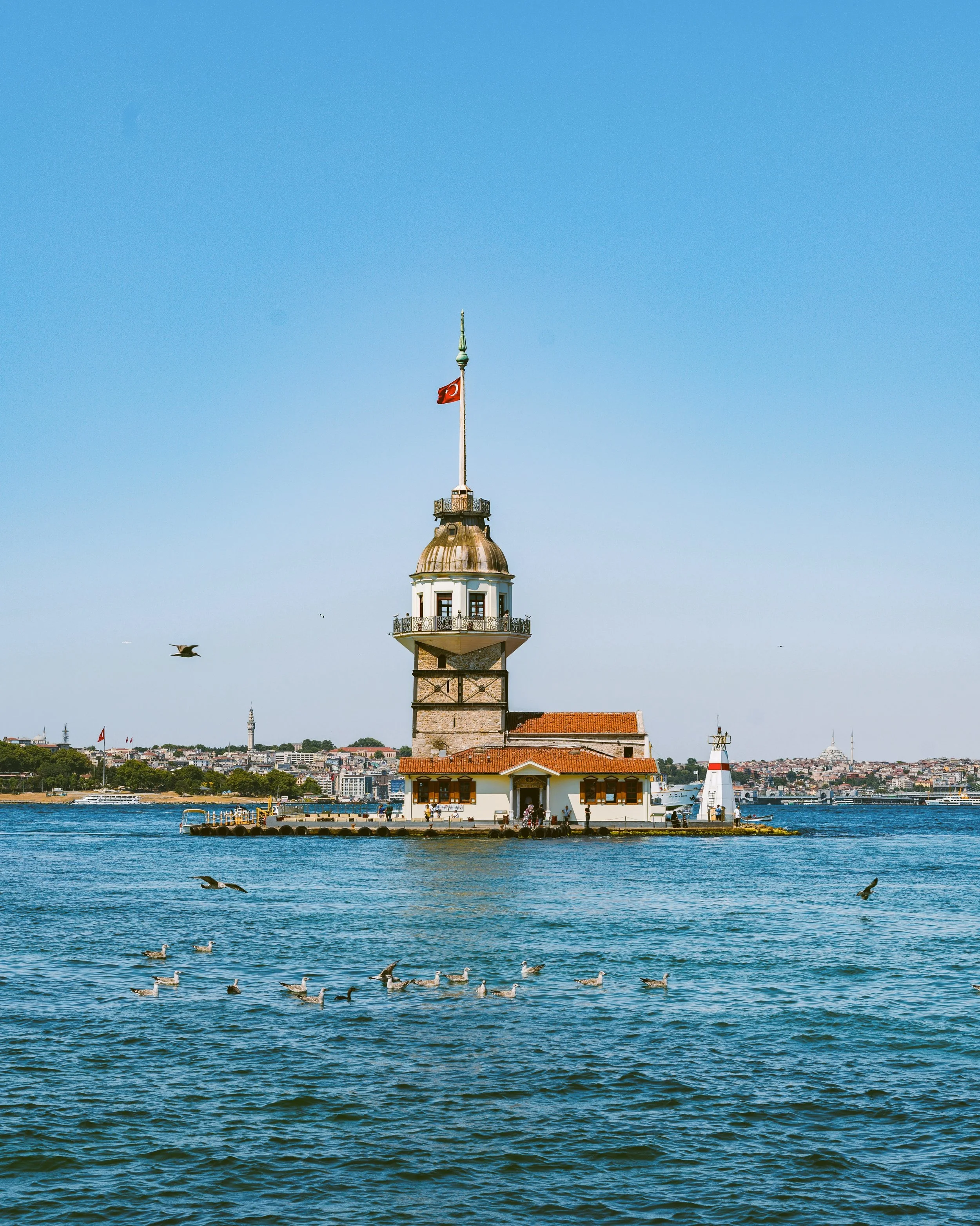 Maiden's Tower (Kiz Kulesi) on a small islet in the Bosphorus under a clear blue sky, Istanbul .
