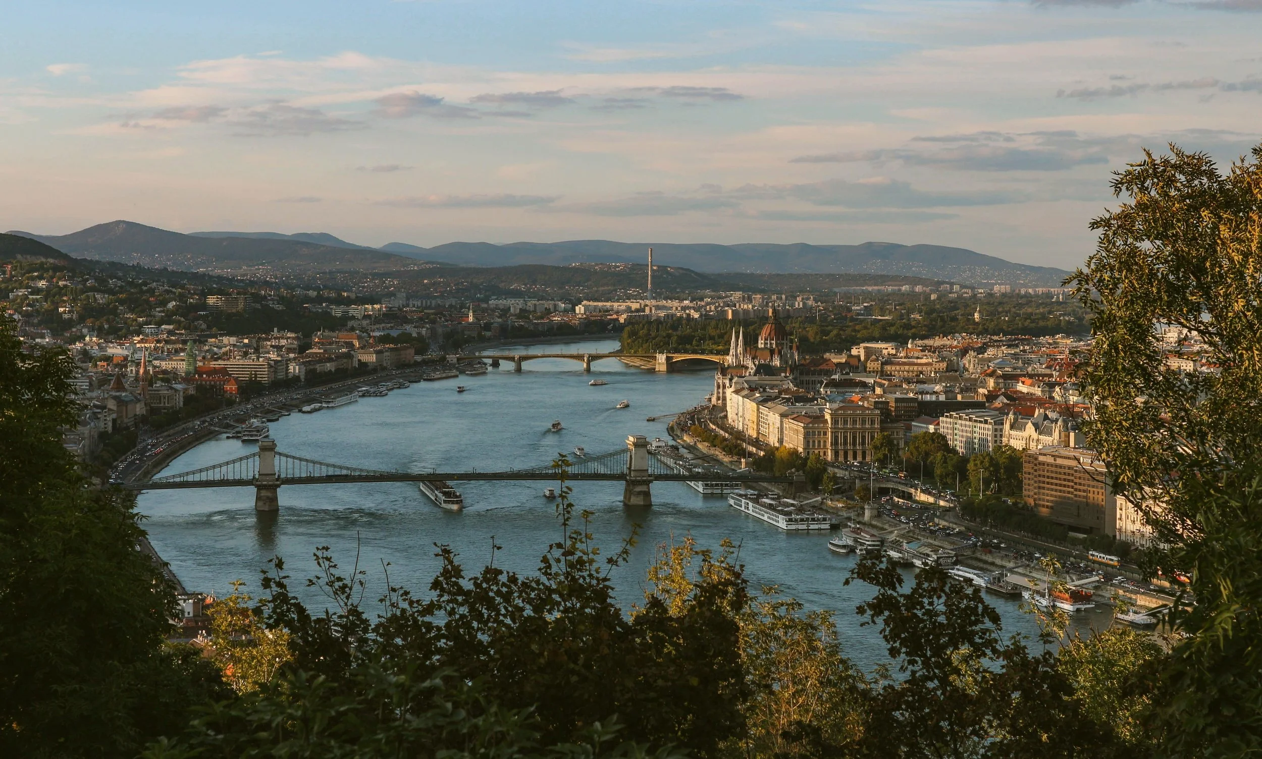 View of the Danube and a bridge from a hilltop at dusk, Budapest